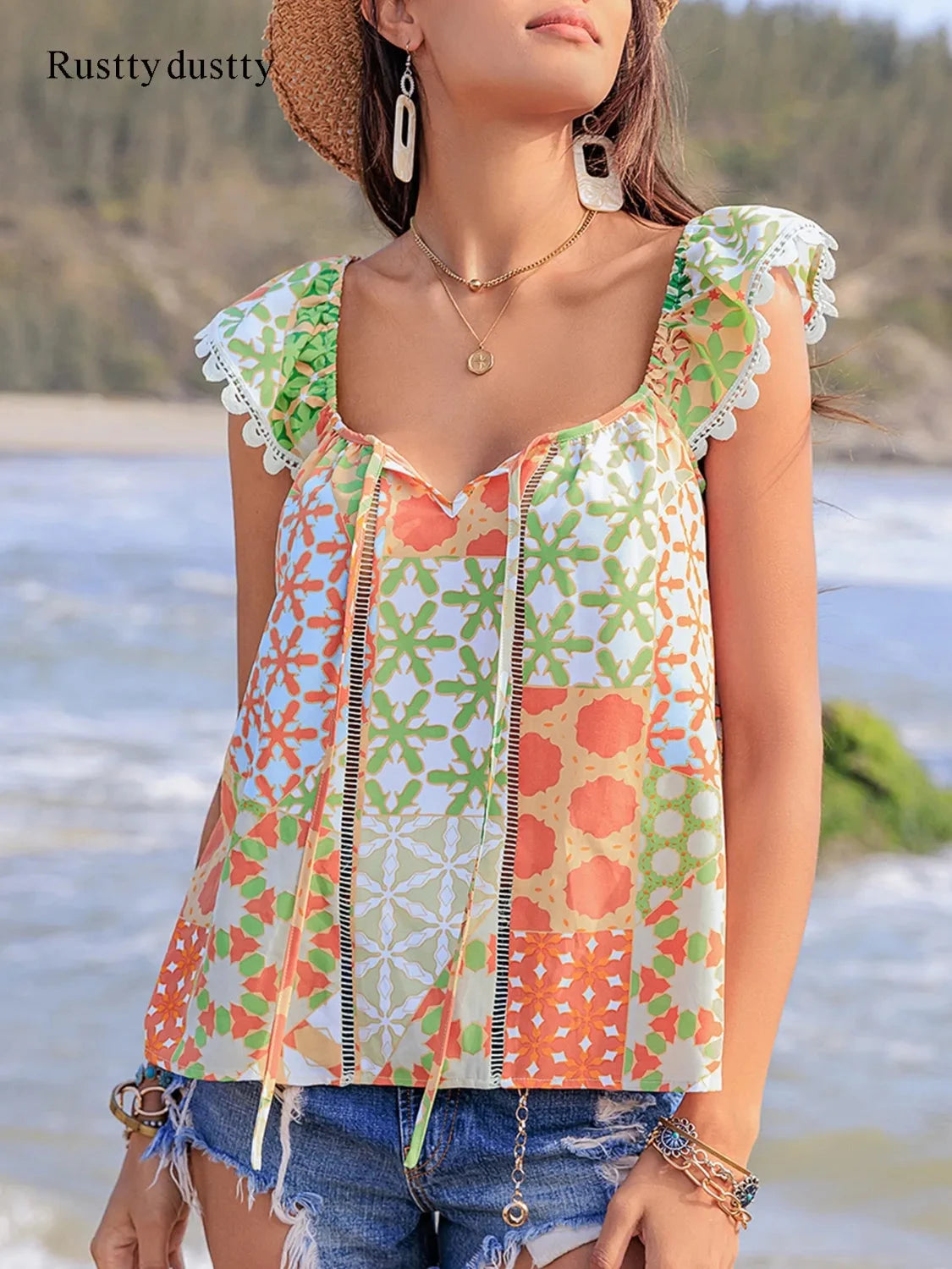 Lace Detail Printed Tie Neck Cap Sleeve Blouse