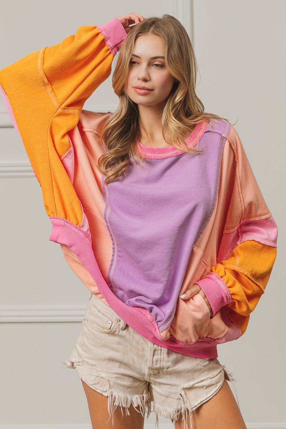 BiBi Color Block Exposed Seam Sweatshirt with Pockets - Laazaar