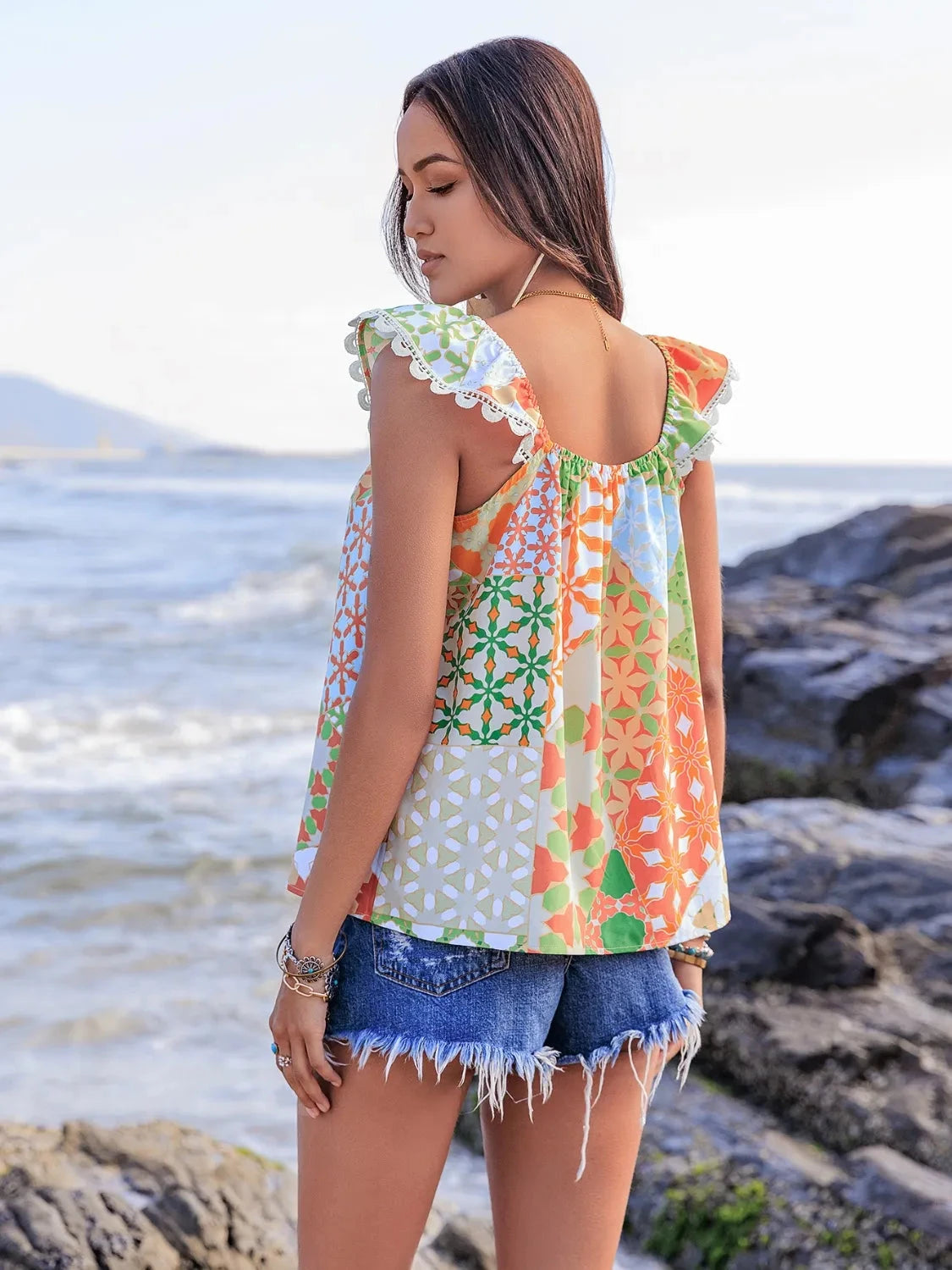 Lace Detail Printed Tie Neck Cap Sleeve Blouse