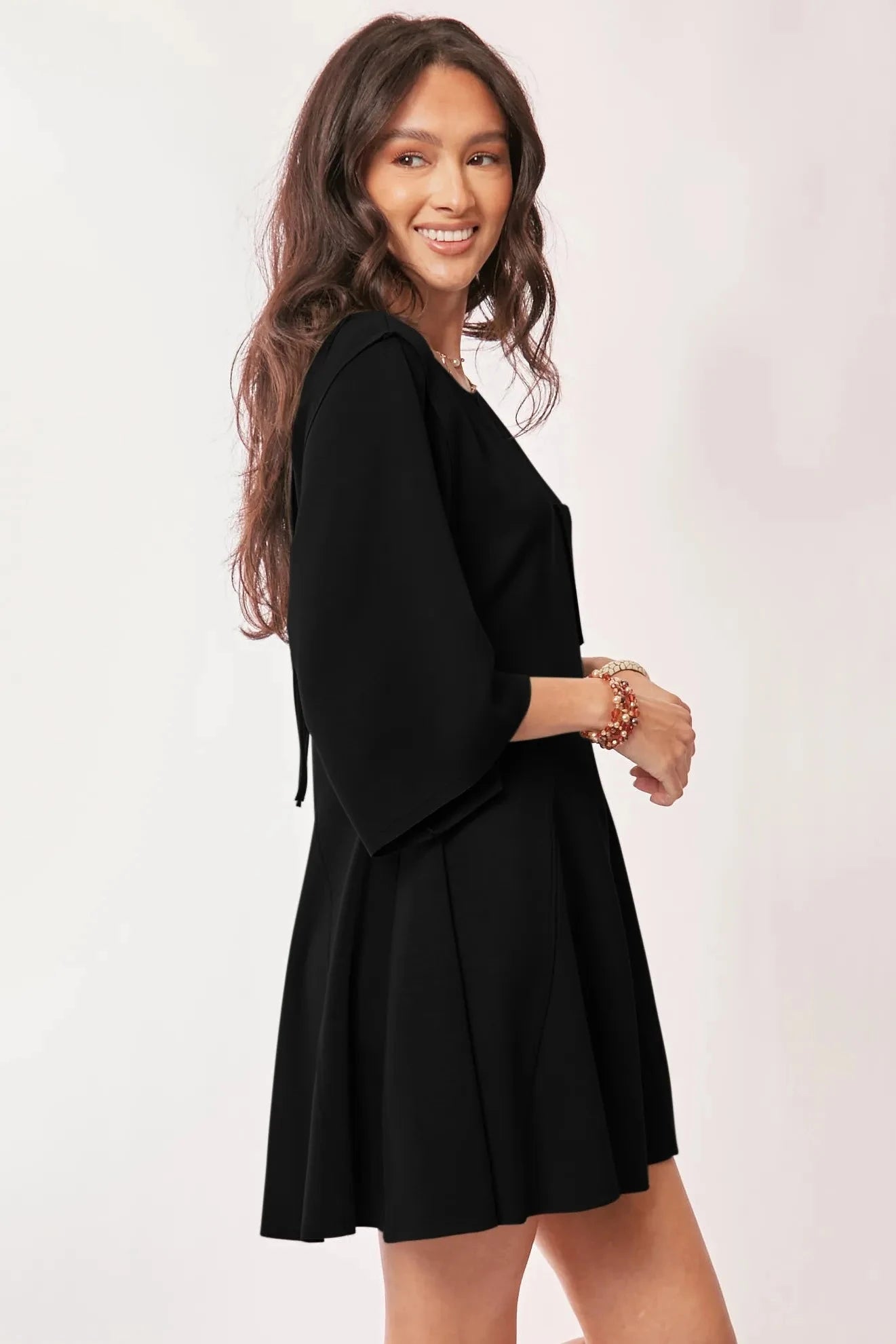 Davi & Dani Solid Draped Sleeve Ties Back Skort Romper